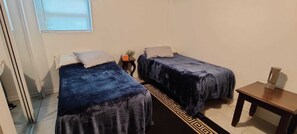 2 bedrooms, desk, iron/ironing board, travel cot