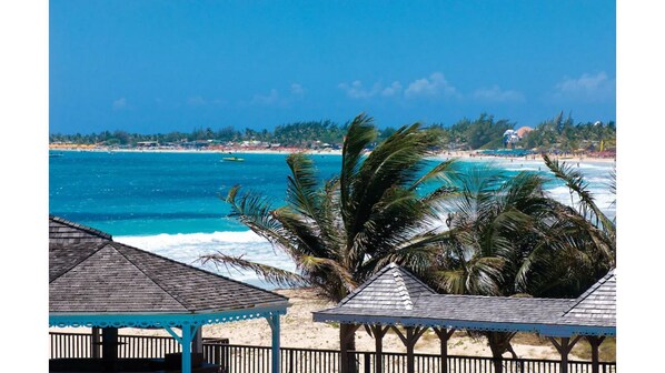 On the beach, sun loungers, beach towels
