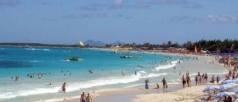 On the beach, sun loungers, beach towels