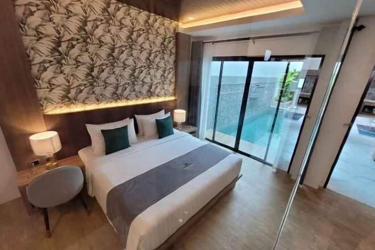 Premium bedding, blackout curtains, soundproofing, iron/ironing board