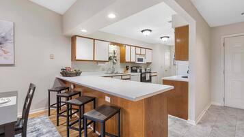 Condo, Multiple Beds, Balcony, Garden View (Skyline View at the Foothills) | Private kitchen | Coffee/tea maker