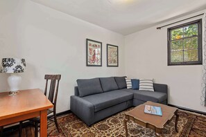 House, 1 Queen Bed with Sofa bed, Patio, Ocean View (Garden Cottage at Miramar Beach) | Living area | 42-inch flat-screen TV with digital channels - Garden Cottage - Miramar Beach With Shared Deck (Santa Barbara)