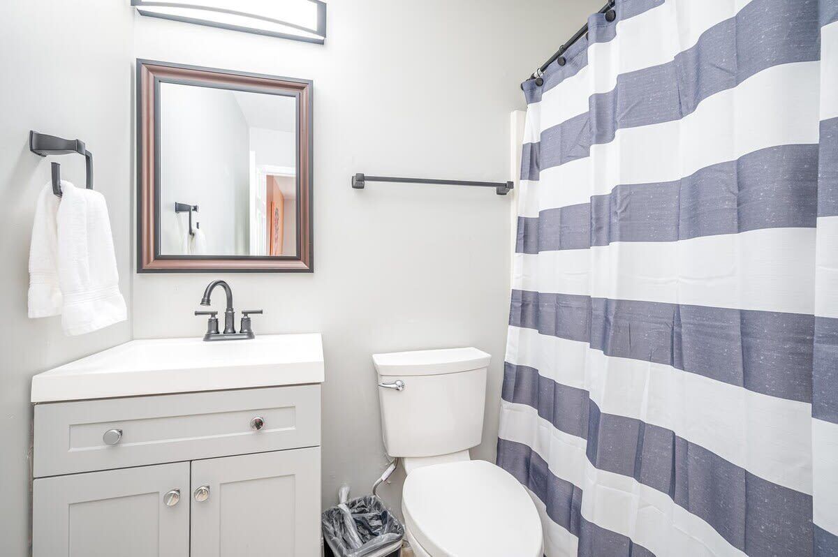 Bathtub, hair dryer, towels