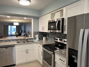 Fridge, microwave, oven, stovetop - Courtside 88 - Forest Beach 1st Floor Flat (Hilton Head Island)