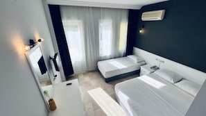 Laptop workspace, free WiFi, bed sheets