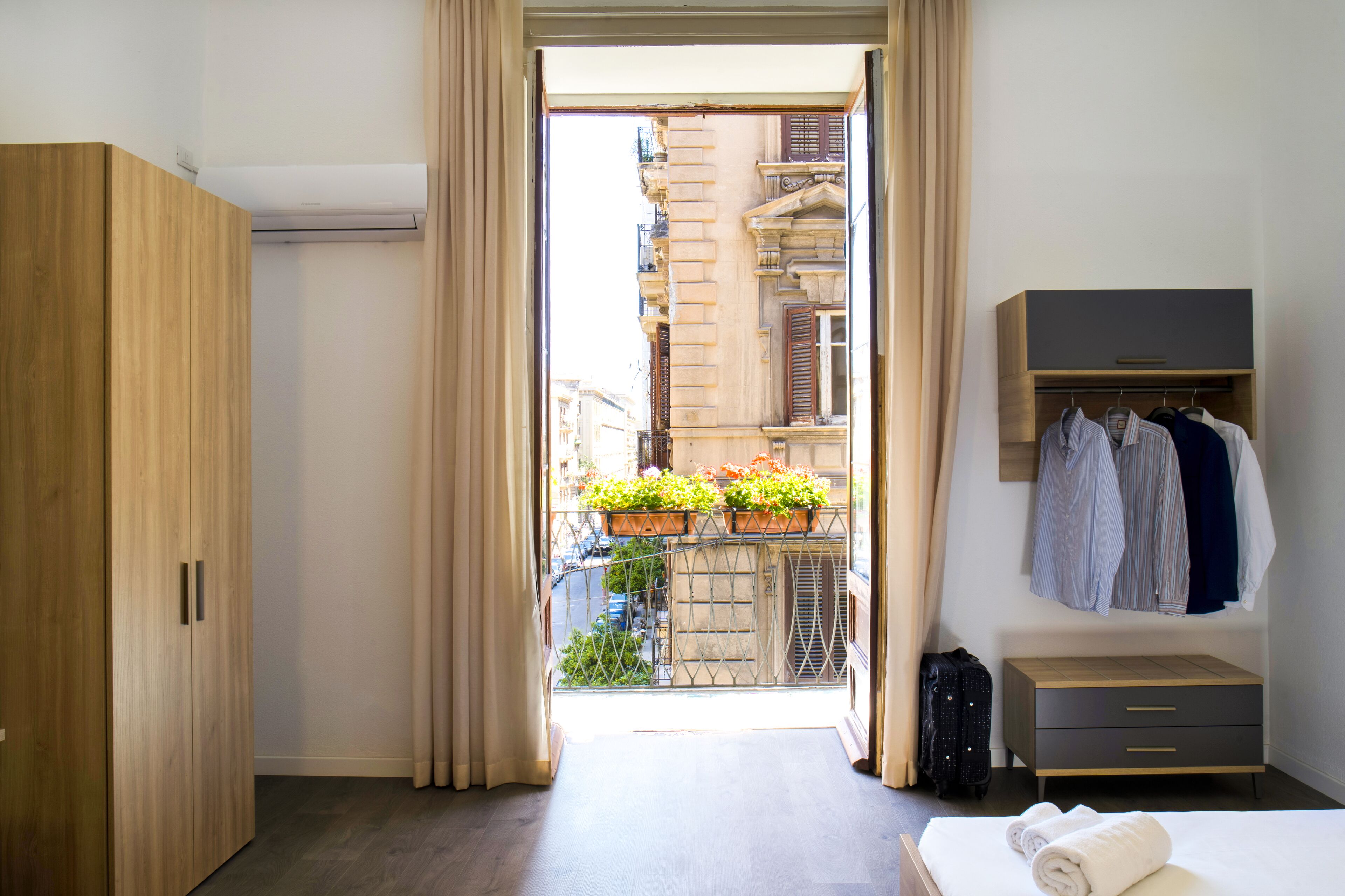 Deluxe Quadruple Room | Down comforters, minibar, in-room safe, individually decorated