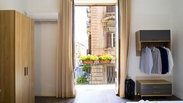 Quadrupla Deluxe | Copriletto in piuma, minibar, una cassaforte in camera