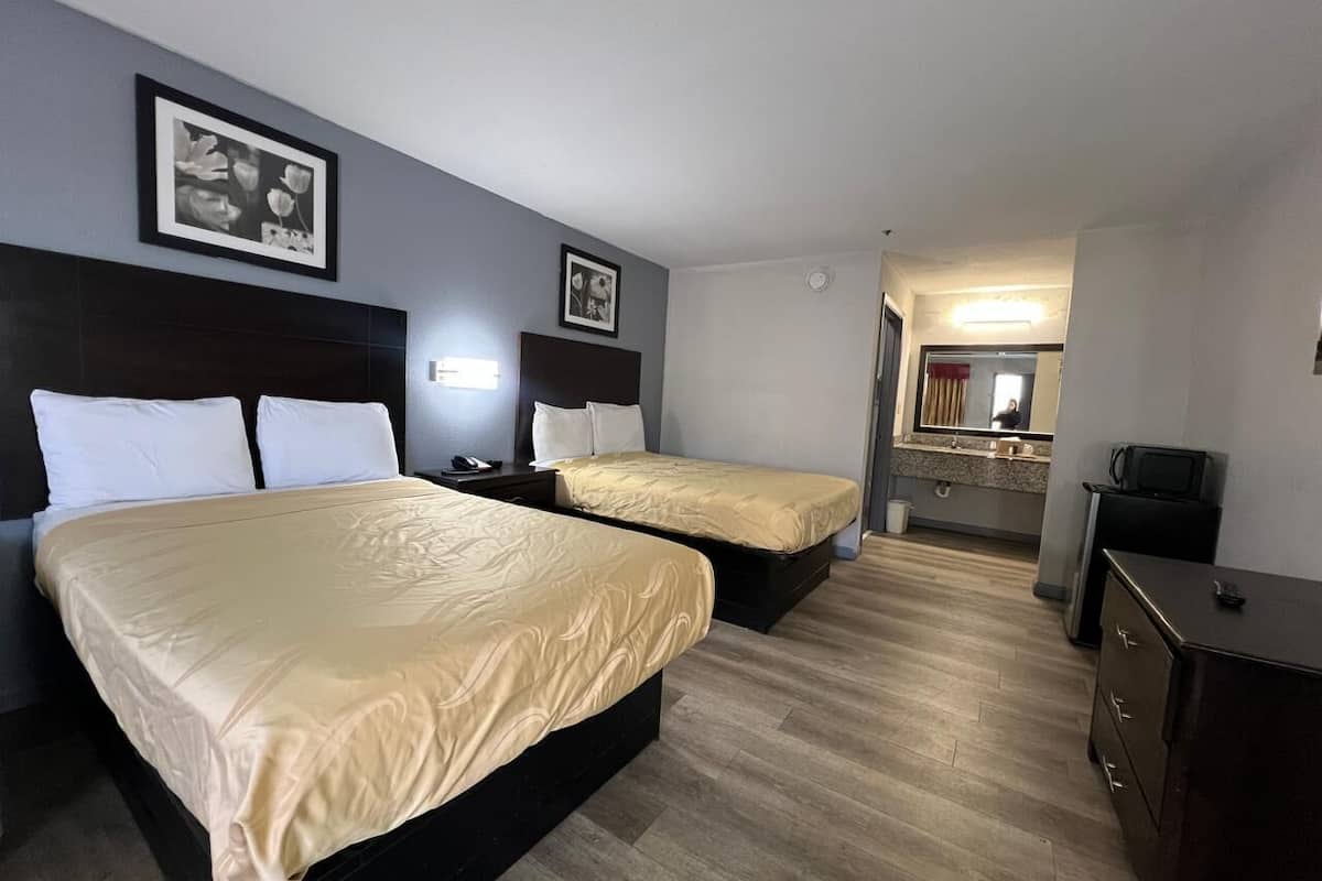 Pillowtop beds, desk, laptop workspace, iron/ironing board