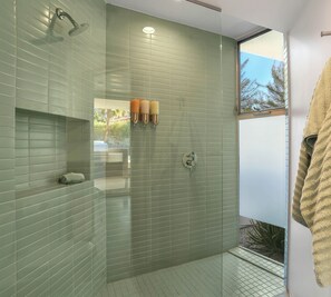 Shower, hair dryer, towels, soap