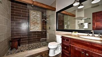 Bathtub, towels, soap, toilet paper