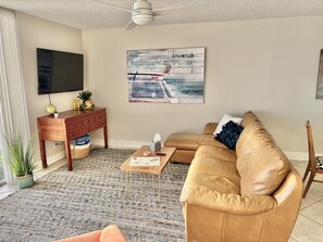 Comfortable living space w/ smart TV, overlooking the beautiful Atlantic Ocean.