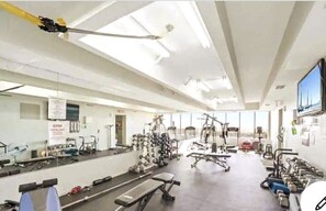 A well-appointed workout facility with a beautiful view. 