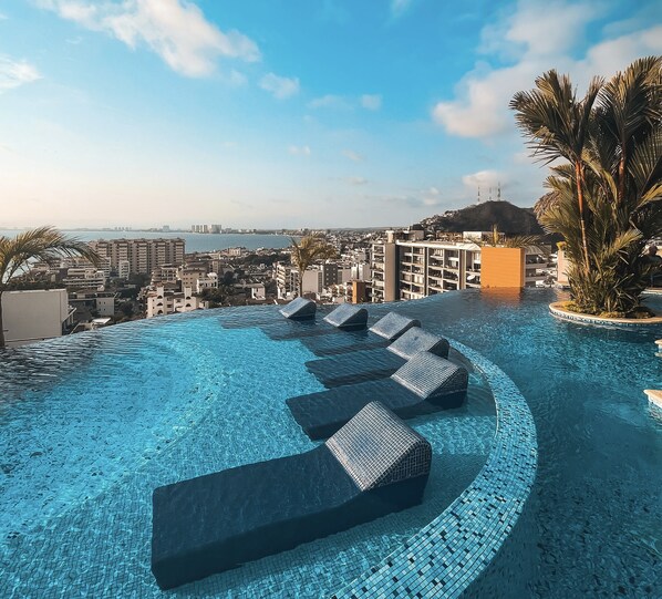 Outdoor pool, a heated pool - Luxury 2BR Condo at Pinnacle in the Romantica Zone (Puerto Vallarta)