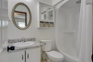 Combined shower/tub, hair dryer, towels, soap