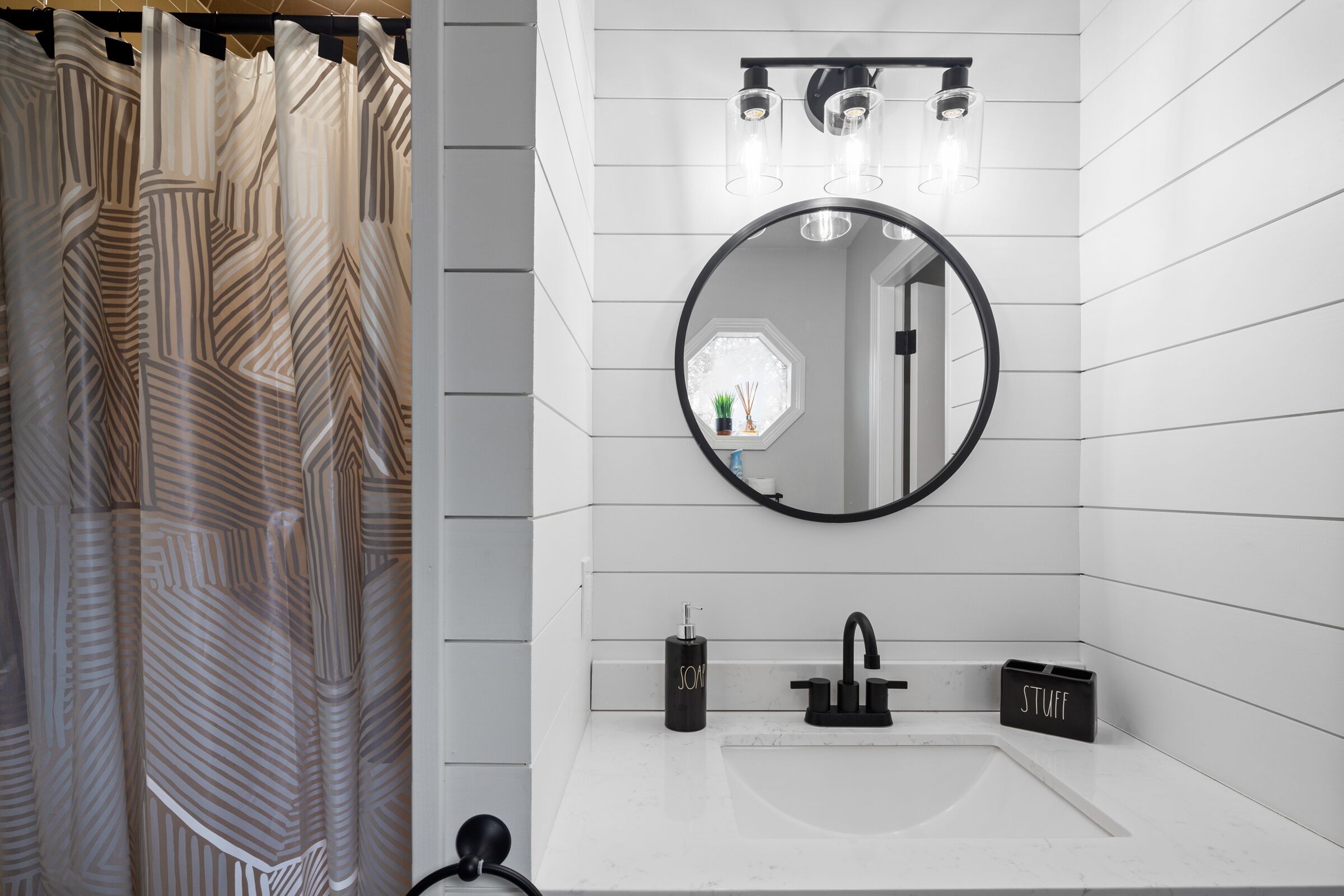 Bathtub, hair dryer, towels, soap