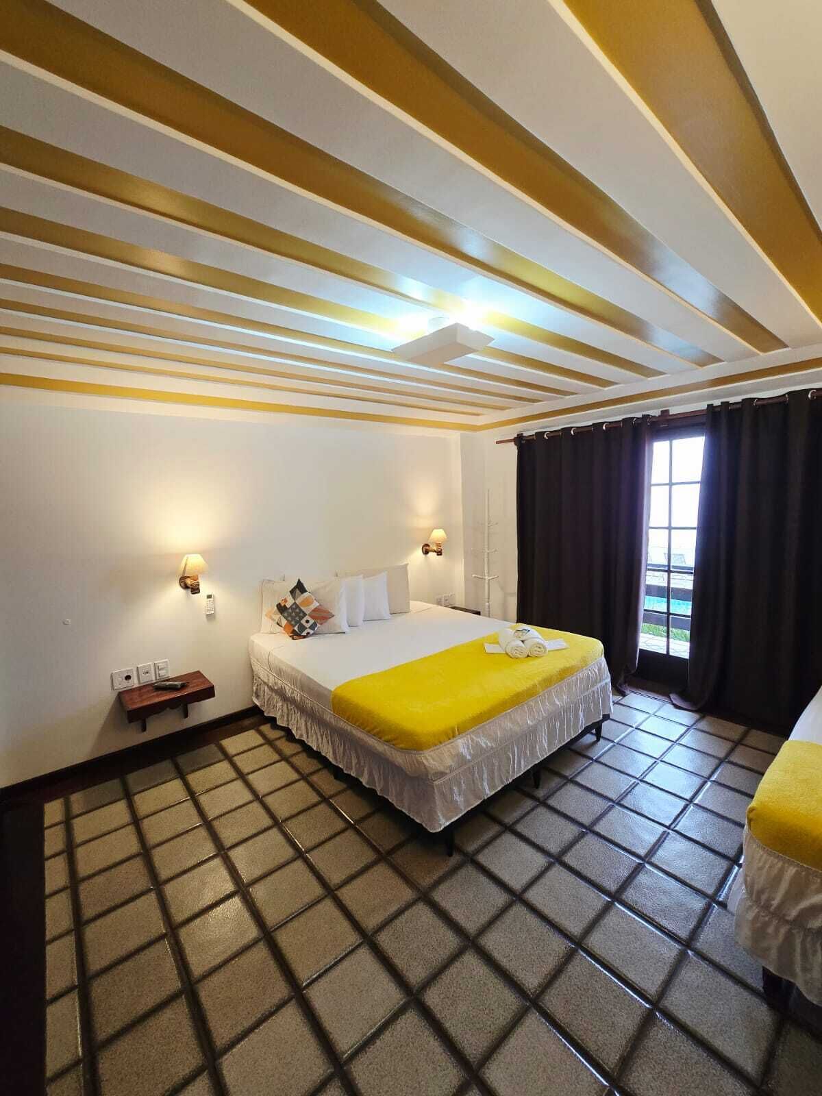 Habitación triple, patio, vistas al mar | Minibar, caja fuerte, wifi gratis