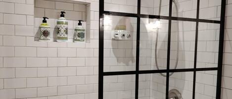 Shower, hair dryer, towels, soap