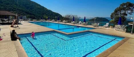 Family Apartment | Pool | Outdoor pool, open 9:00 AM to 7:00 PM, pool umbrellas, sun loungers