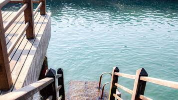 Outdoor pool, pool umbrellas, sun loungers