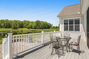 Outdoor dining - Bear Trap Dunes - waterfront home with golf, pool, fitness room, & tennis (Ocean View)