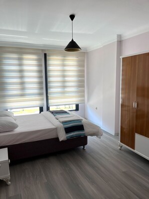 2 chambres, chambres insonorisées, fer et planche à repasser