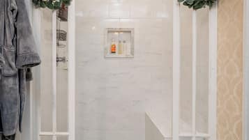 Bathtub, hair dryer, towels, soap