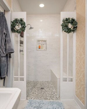 Bathtub, hair dryer, towels, soap