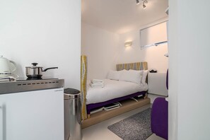 Desk, iron/ironing board, internet, bed sheets