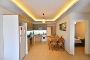 Comfort Apartment | Dapur peribadi | Peti sejuk, ketuhar, mesin basuh pinggan mangkuk, pembakar roti 