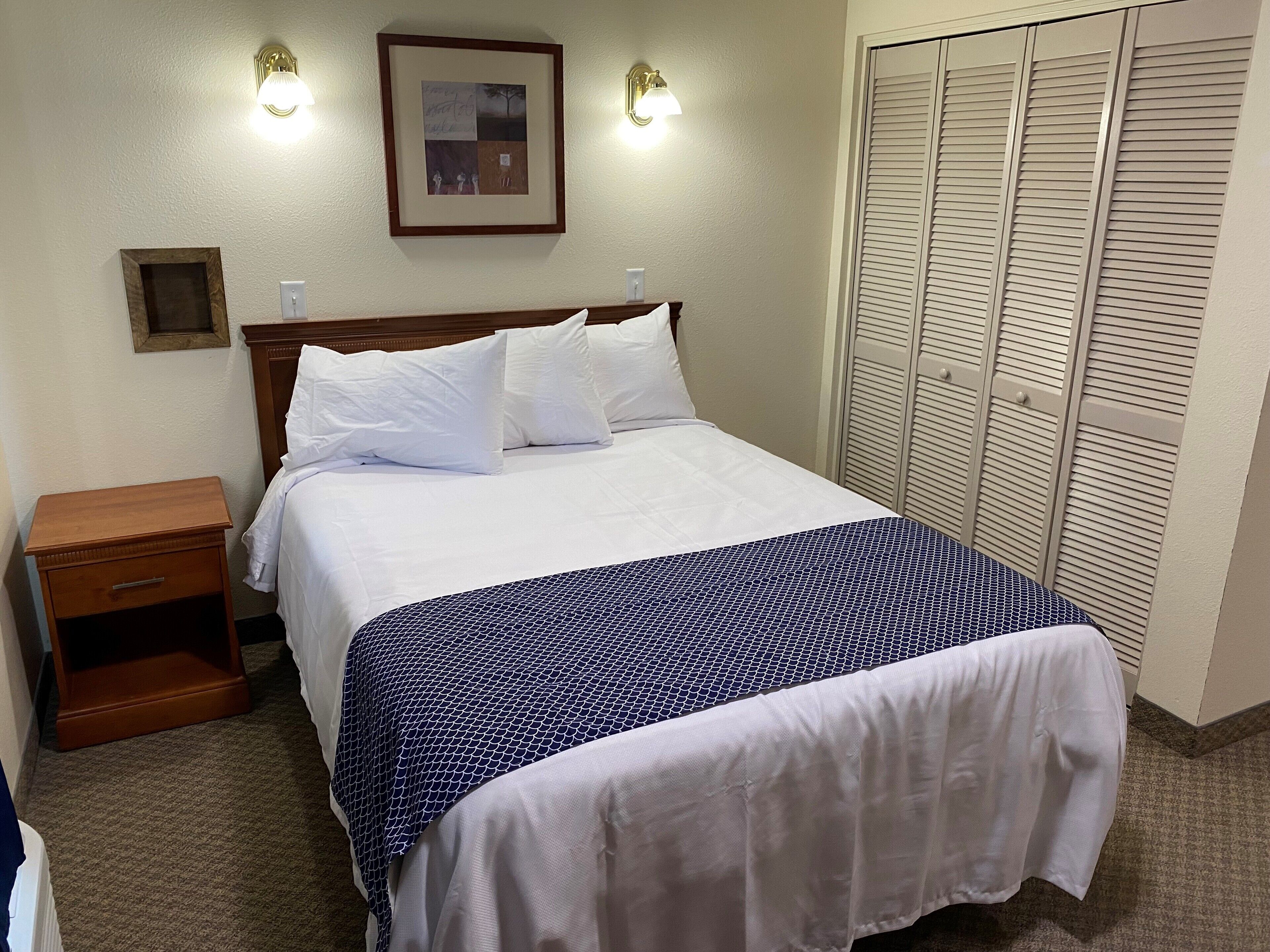 laptop workspace, blackout curtains, free wifi, bed sheets