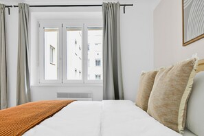 2 chambres, fer et planche à repasser, Wi-Fi, draps fournis