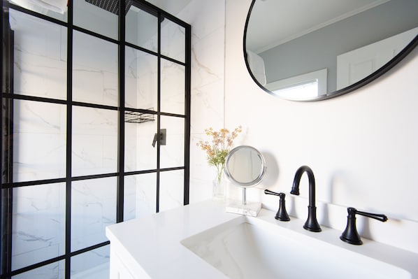 Shower, hair dryer, towels, soap