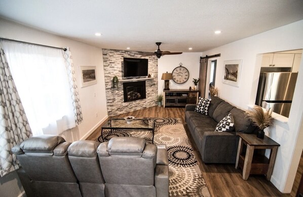 Smart TV, fireplace, books