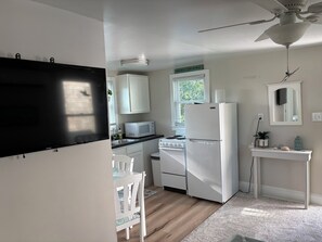 Fridge, microwave, oven, stovetop - The Sand Bucket is within walking distance to the beach and boardwalk. (Carolina Beach)