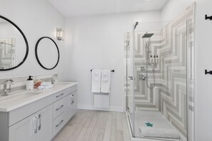 Combined shower/tub, hair dryer, towels, soap