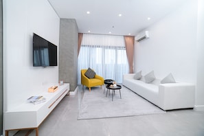 3 bedroom Executive Suite | Living area | 50-inch Smart TV with digital channels, TV