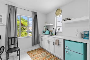 Fridge, microwave, stovetop, coffee/tea maker