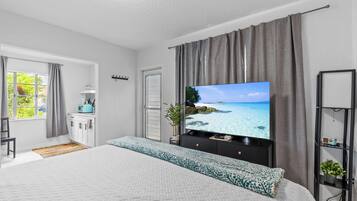 Iron/ironing board, travel crib, free WiFi, bed sheets