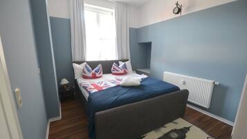 1 slaapkamer, een strijkplank/strijkijzer, internet, beddengoed