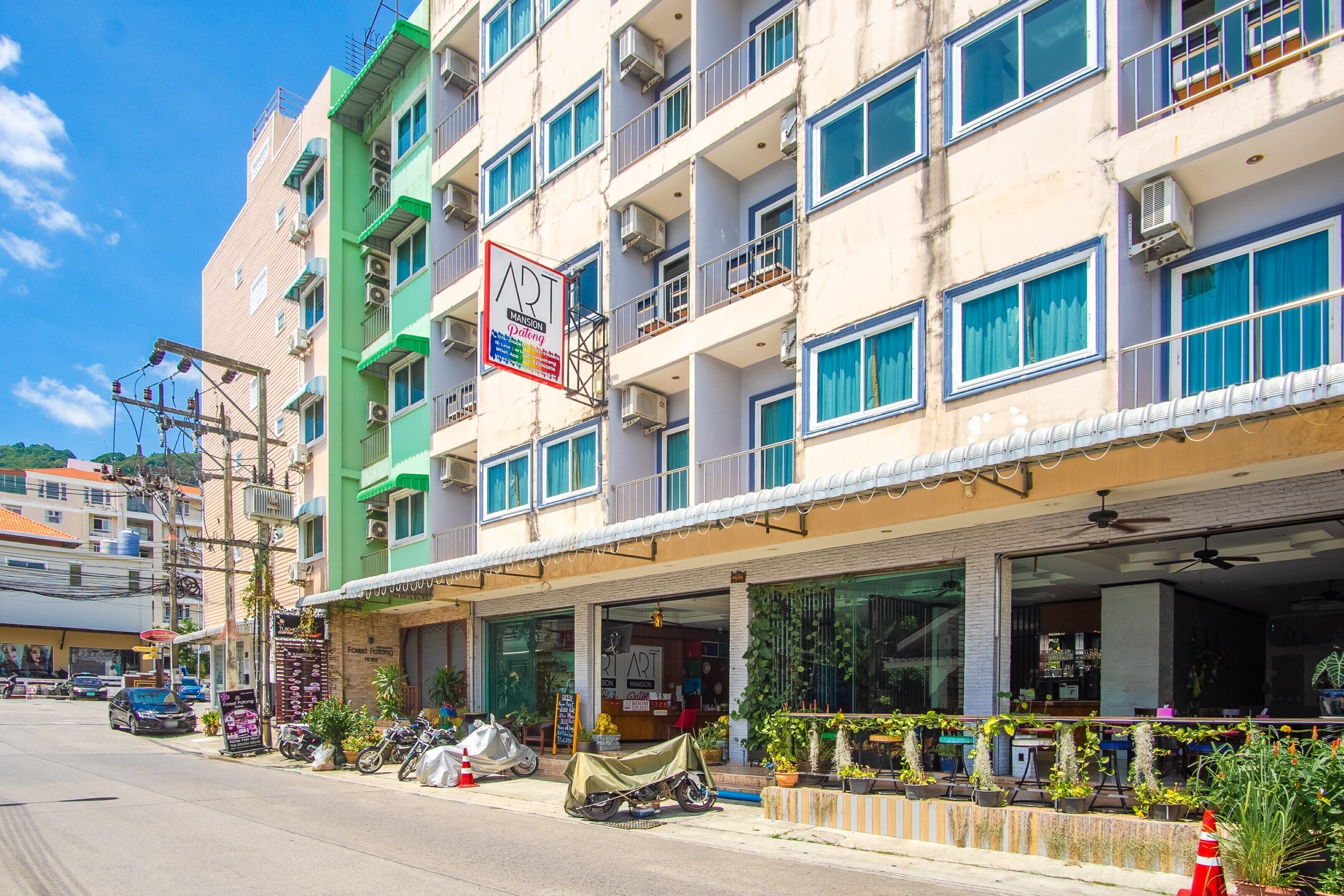 A multi-story building with a storefront on the ground floor.