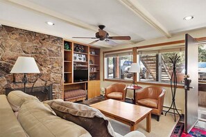 TV, fireplace - Silverglo Condominiums Unit 105 | Cozy Condo Walking Distance to Town with Access to a Pool (Aspen)