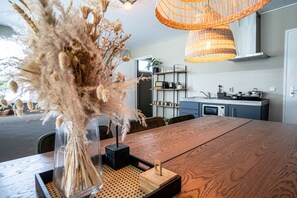 Appartement Deluxe | Coin séjour | Télévision