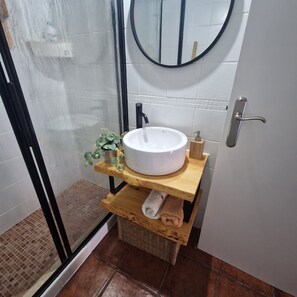 Bathtub, hair dryer, towels, soap