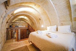 Frette Italian sheets, premium bedding, memory-foam beds, minibar