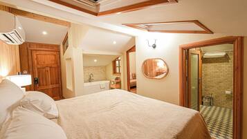 Frette Italian sheets, premium bedding, memory-foam beds, minibar