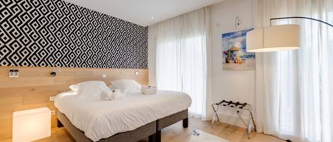 4 habitaciones, tabla de planchar con plancha, cuna de viaje y wifi
