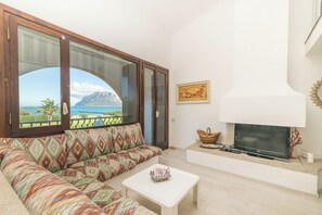 21-inch flat-screen TV with cable channels, TV