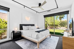 King bedroom with natural light and direct access to the outdoors