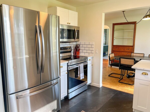 Fridge, microwave, oven, stovetop - Whimsical Midcentury Farmhouse with Game Room (Springfield)