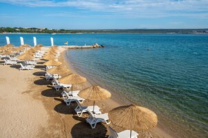 Private beach, sun loungers, beach umbrellas, beach bar